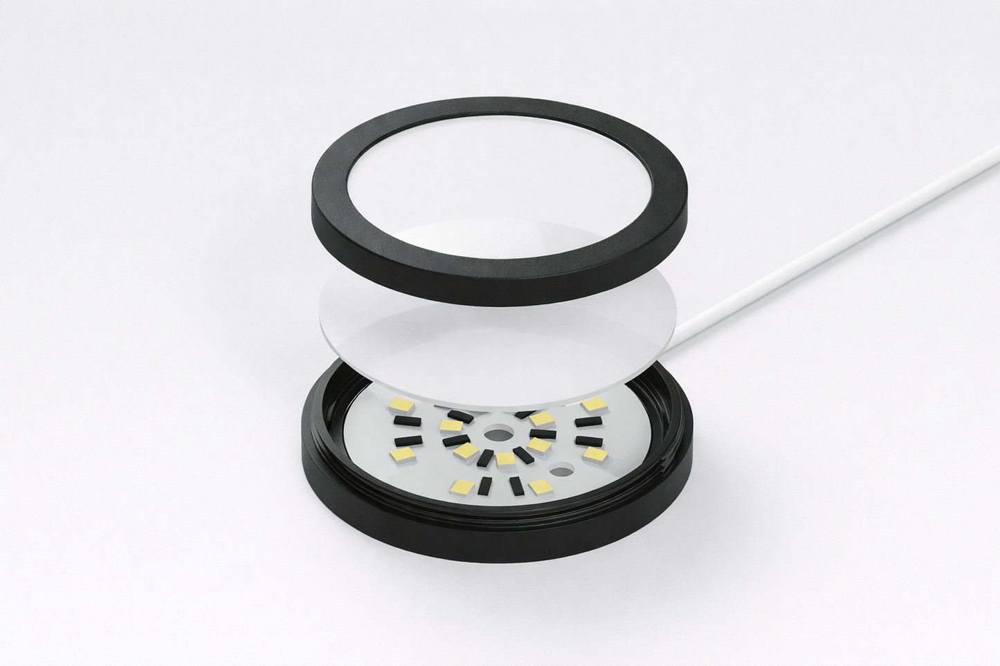 Close-up of a cylindrical electronic component with LED lights on a white background