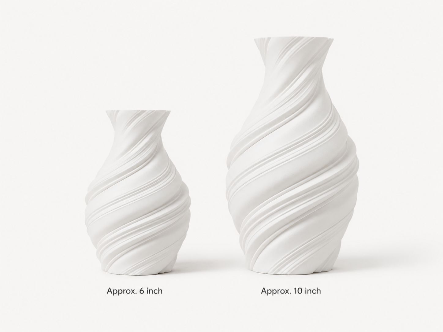 Two white spiral-patterned ceramic vases shown on a light gray background, labeled 'Approx. 6 inch' and 'Approx.
