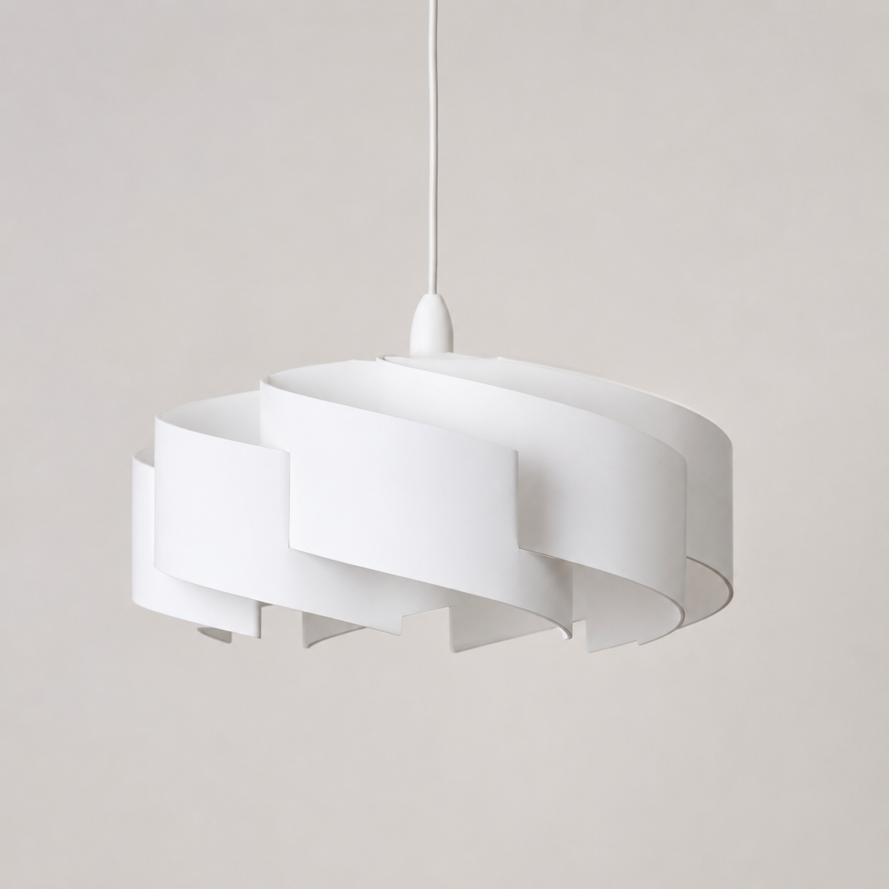 White pendant lamp on a plain background