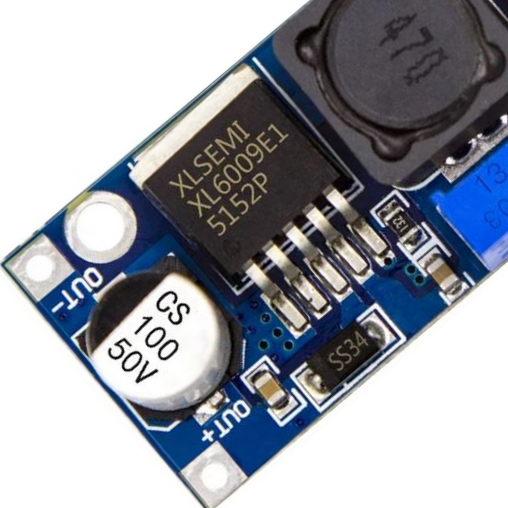 XL6009 DC-DC boost converter IC close-up showing step-up voltage regulator chip used in Arduino, ESP32, battery, and DIY electronics projects