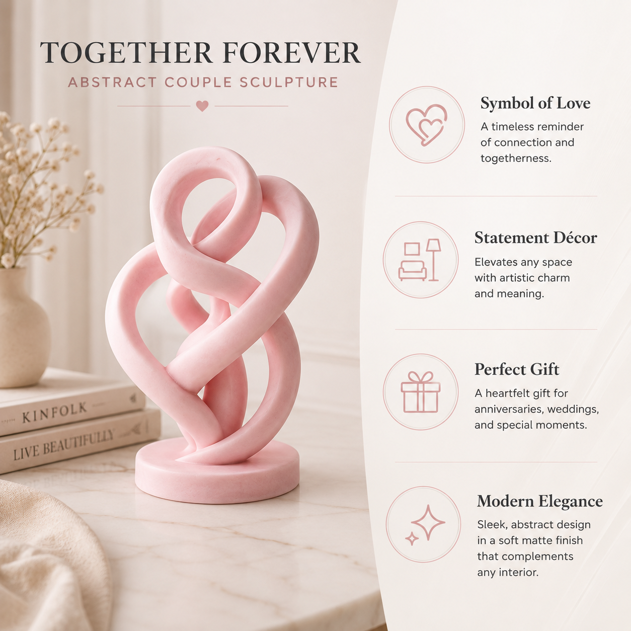 A pink abstract couple sculpture sits on a light marble surface beside stacked books, with promotional text on the right describing it as a symbol of love, statement decor, perfect gift, and modern elegance.