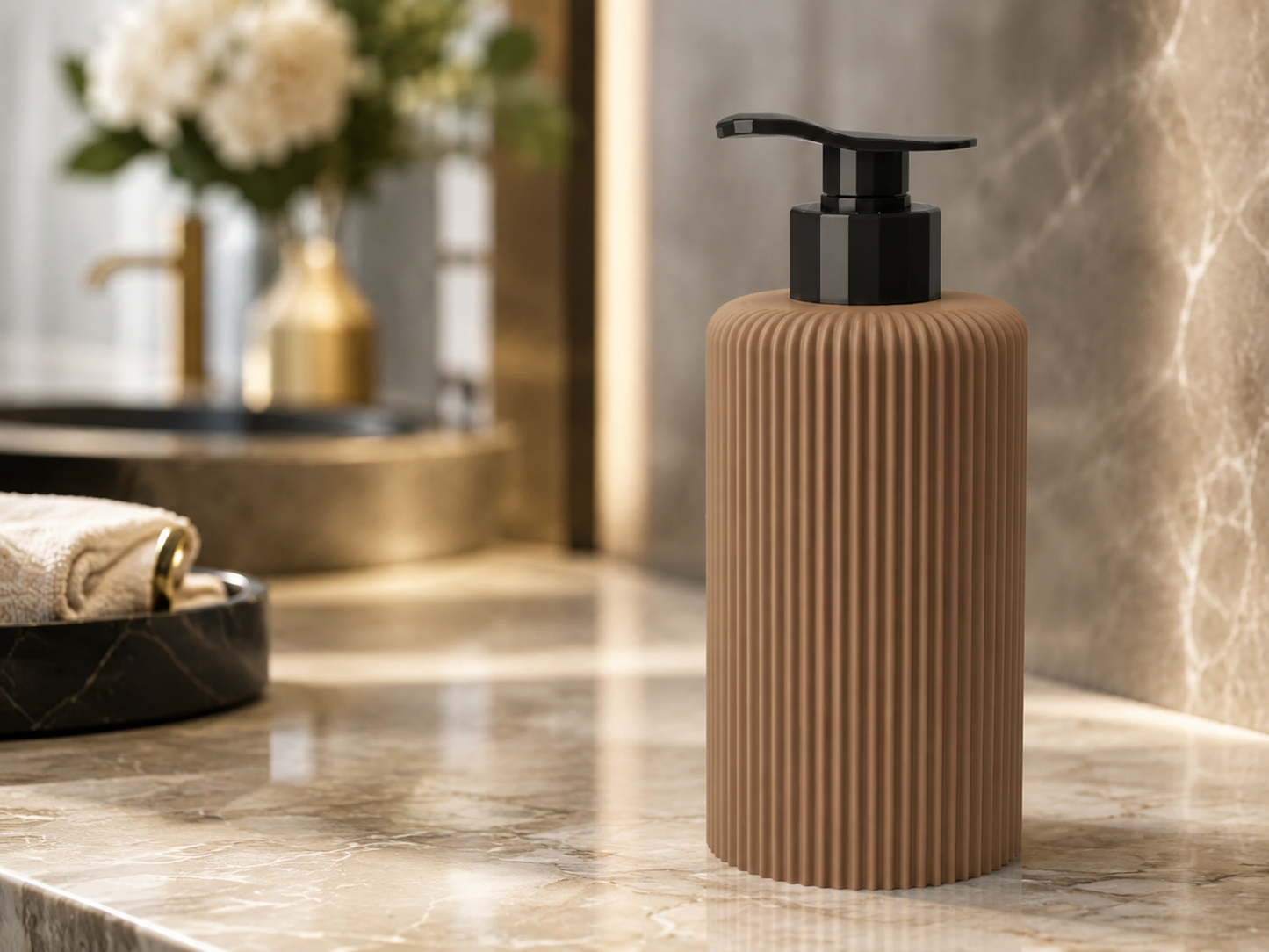 A ribbed beige pump bottle with a black dispenser, standing on a polished marble countertop in a modern bathroom setting.