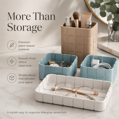 Three modular plastic organizer trays in beige, light blue, and white, styled with cosmetics, jewelry, and eyeglasses on a marble surface. Text on the left reads 'More Than Storage' with feature callouts.
