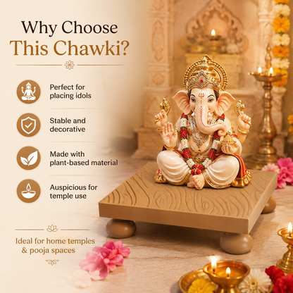 A decorative Ganesha idol seated on a wooden platform, shown in a styled temple-like setting with lit oil lamps and flowers. Large marketing text on the left reads 'Why Choose This Chawki?' with feature icons for placing idols, stability and decorativity, plant-based material, and auspicious temple use.