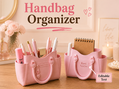 Two pink handbag-shaped desk organizers on a wooden surface, filled with pens and a notebook. The scene has decorative props including flowers, a candle, and framed wall art, with large text reading 'Handbag Organizer' and smaller text including 'Editable Text'.