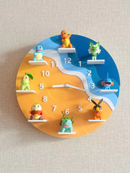 A round wall clock featuring colorful Pokémon characters mounted on white platforms at each hour position, with a blue and orange wavy face design on a beige textured wall.