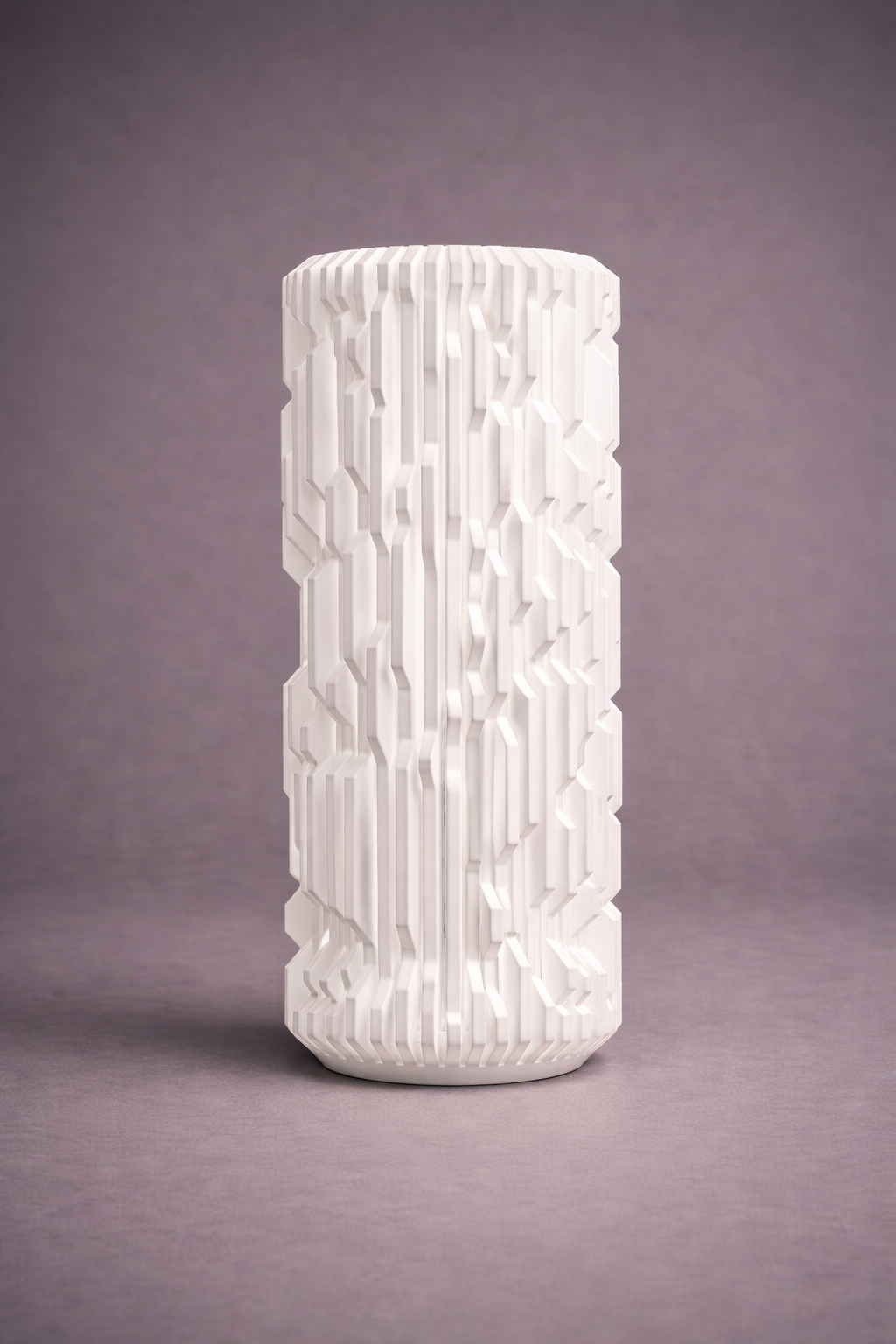 White textured vase on a gray background