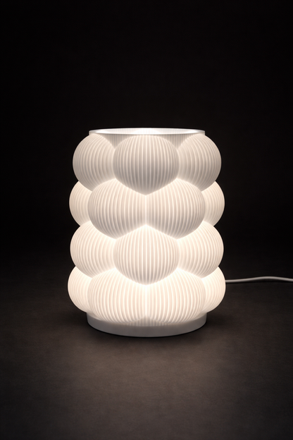 White textured table lamp on a dark background