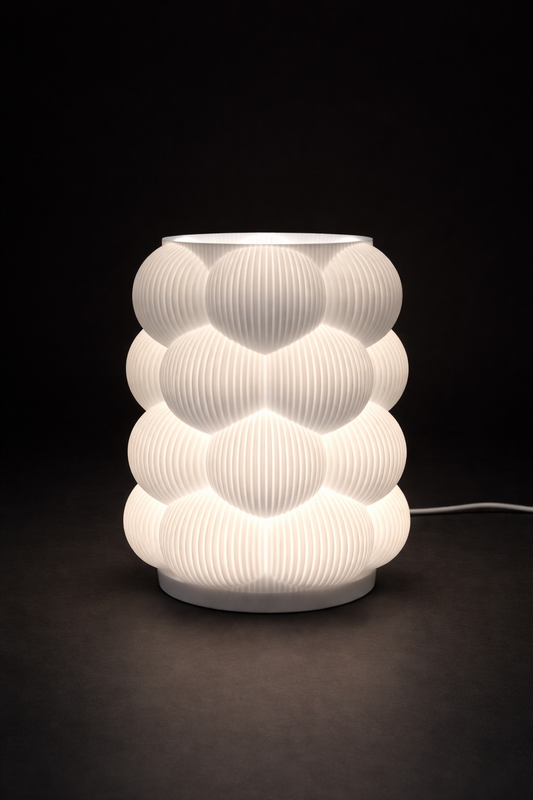 White textured table lamp on a dark background