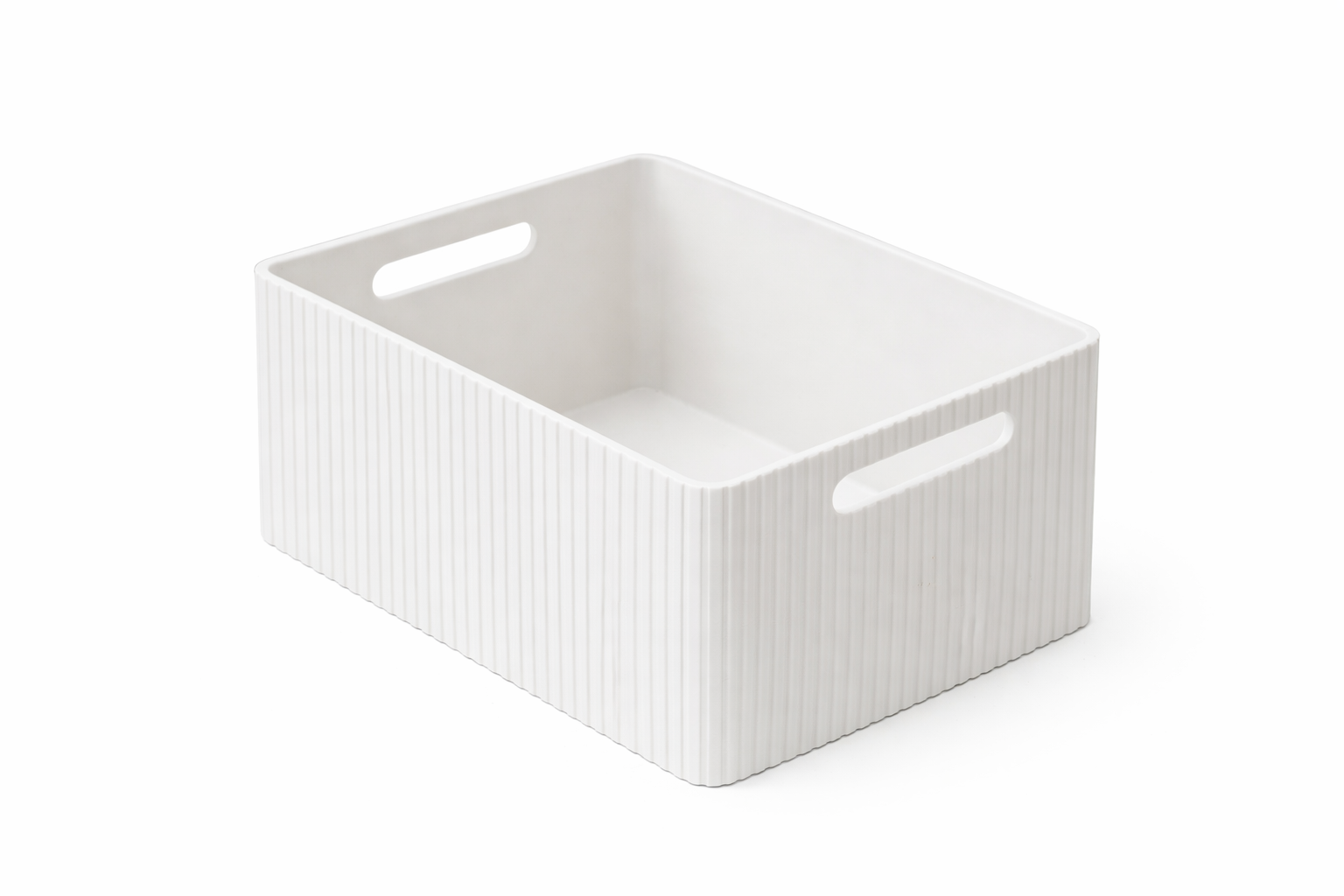 White storage basket with handles on a white background