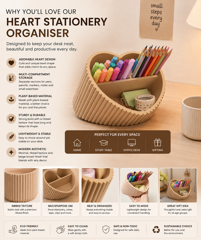 A heart-shaped cardboard desk organizer filled with colored pencils, pens, and a small roll of tape, shown on a beige desk with a coffee cup. The image includes marketing text and feature icons explaining the product's heart-shaped design, multi-compartment storage, plant-based material, and suitability for home, study, office, and gift use.