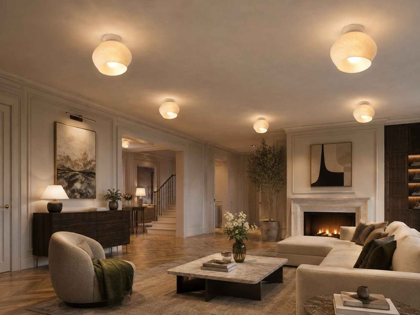Luxurious living room with a fireplace, sofa, and decorative items.
