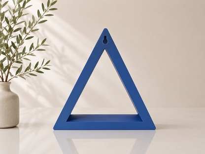 Blue triangle ShapeScape floating wall shelf shown in a clean product view
