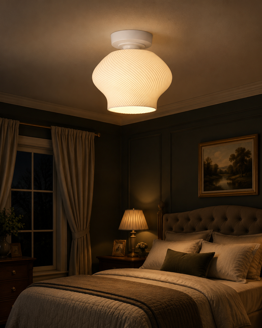 Bedroom with a large ceiling light fixture casting a warm glow.
