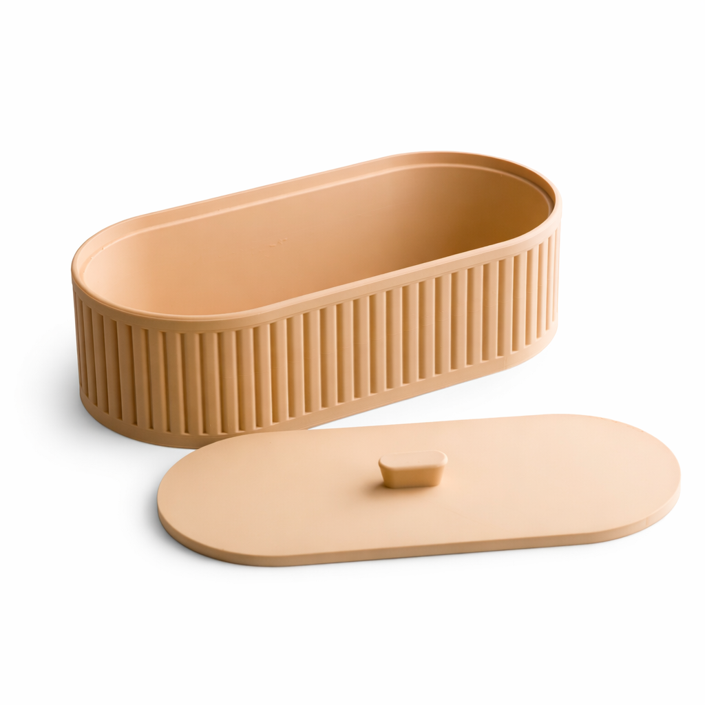 Beige plastic container with a lid on a white background