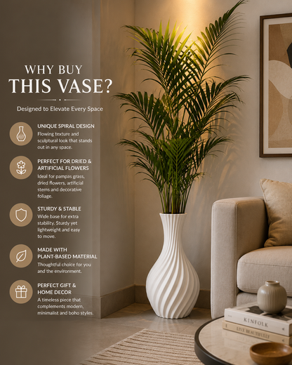 A tall potted palm plant in a white ribbed spiral vase placed in a styled living room corner beside a beige sofa, with a text panel on the left reading 'WHY BUY THIS VASE?'. The product being sold appears to be the vase, not the plant or furniture, so this is best classified as Lifestyle because a real interior environment is clearly present.