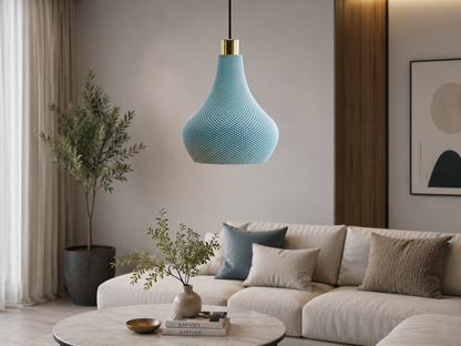 Modern living room with a light blue pendant lamp, beige sofa, and decorative elements.
