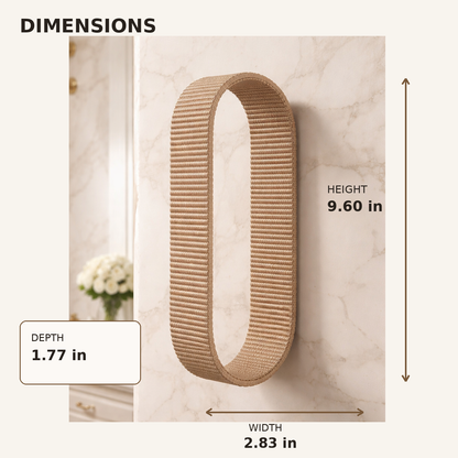 A wall-mounted oval cat scratcher made of tan sisal rope is shown on a light marble wall with dimension callouts indicating height 9.60 in, width 2.