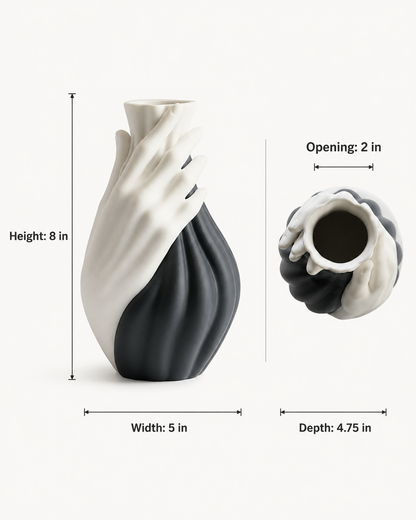 A sculptural vase with a hand-shaped design, shown with dimension callouts: height 8 in, width 5 in, depth 4.75 in, and an opening of 2 in.